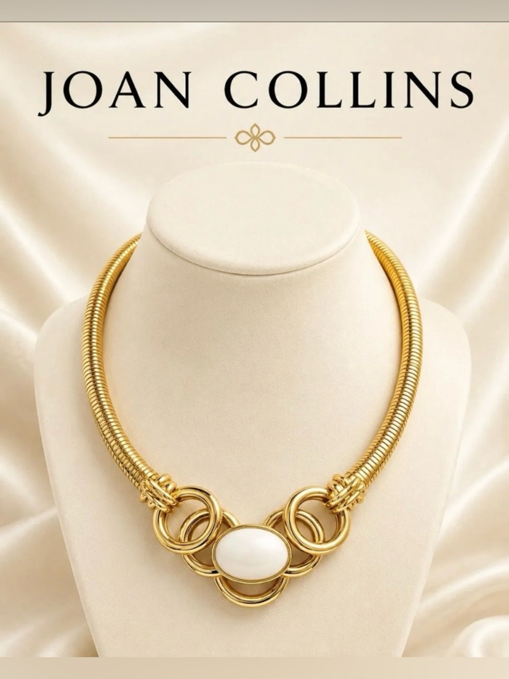 Joan Collins Gold Necklace with a Creamy White Cabochon center